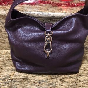 Dooney and Bourke leather Hobo with logo lock.